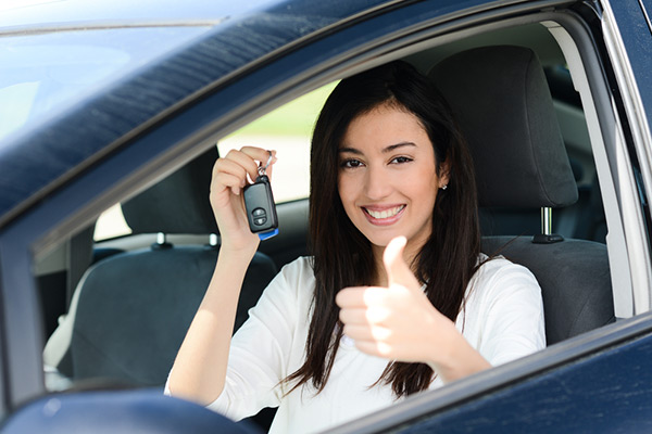 women satisfied with car rental service